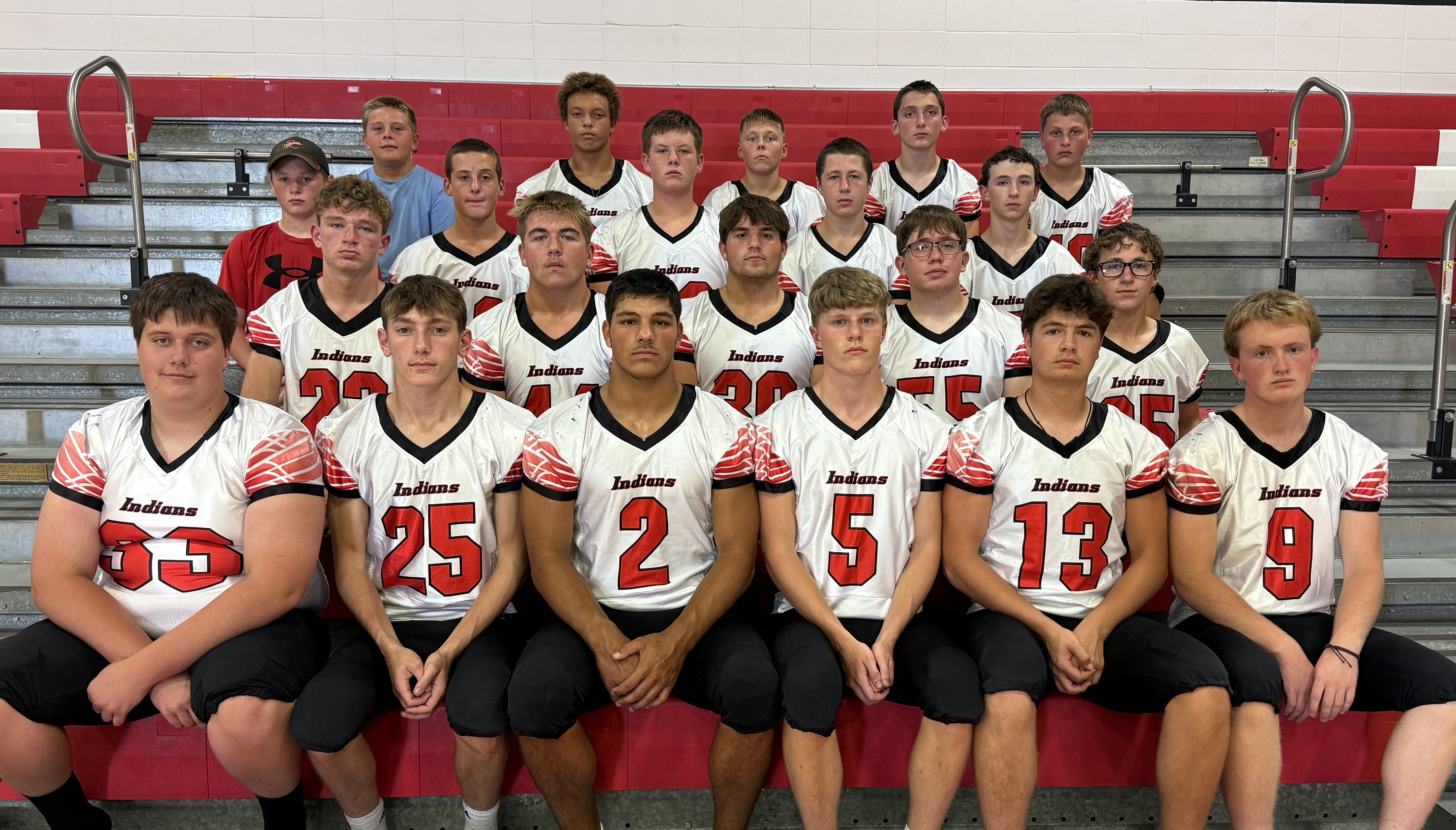 boys in football uniform