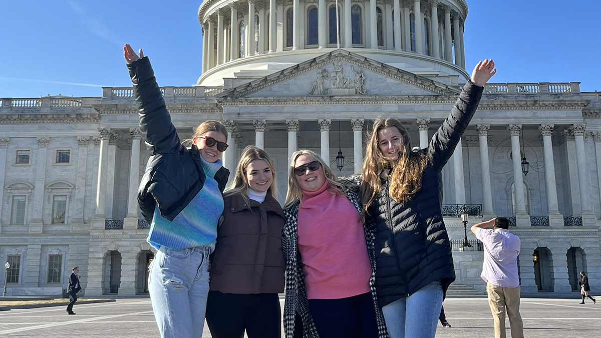 group of students standing outside the U.S. Capitol in Washington, D.C.