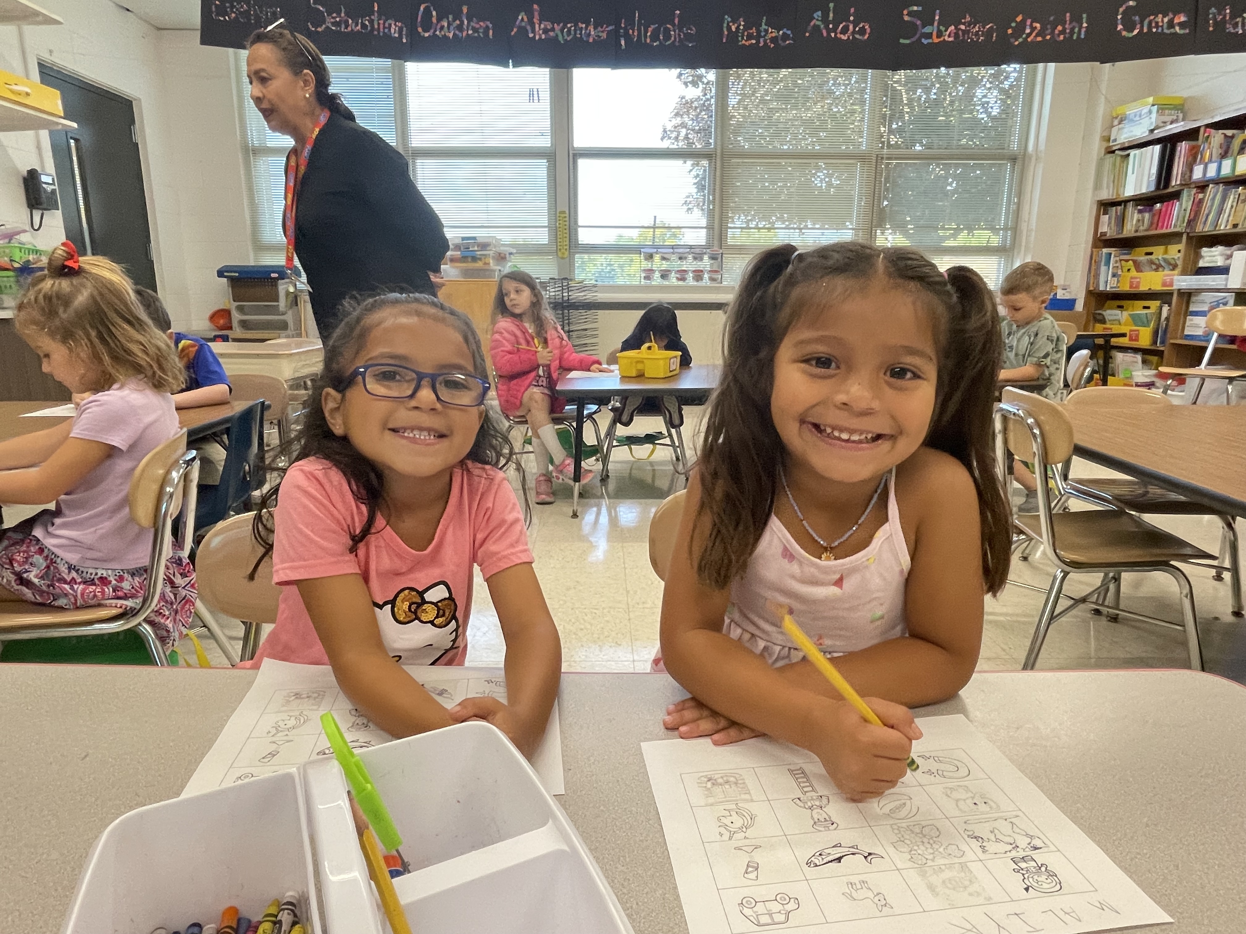 two students smiling 
