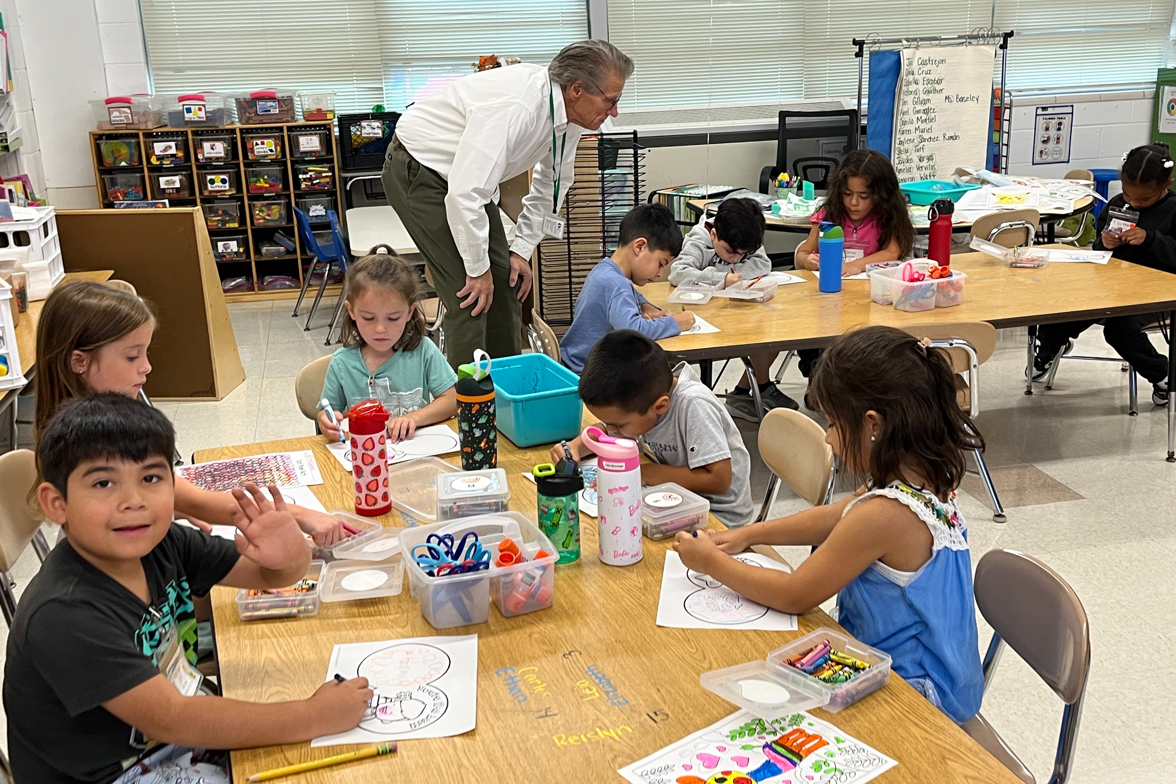 student work at tables in a Dual Language classroom