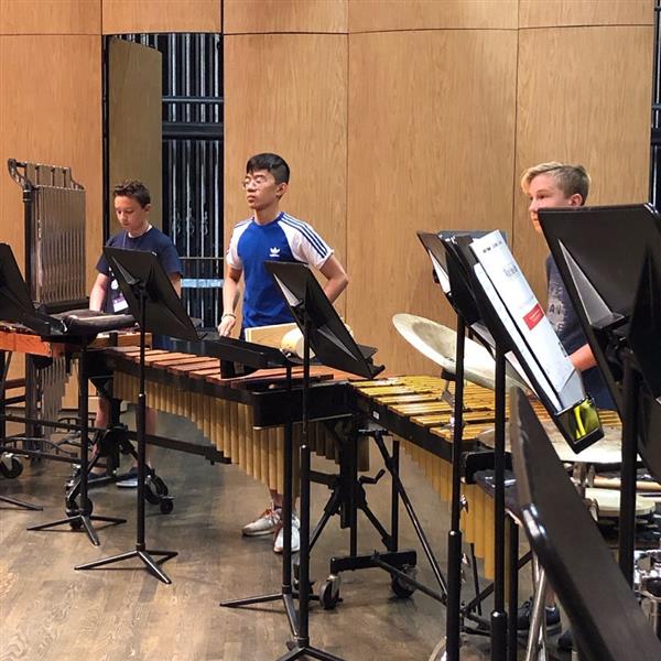 Photo of students playing music