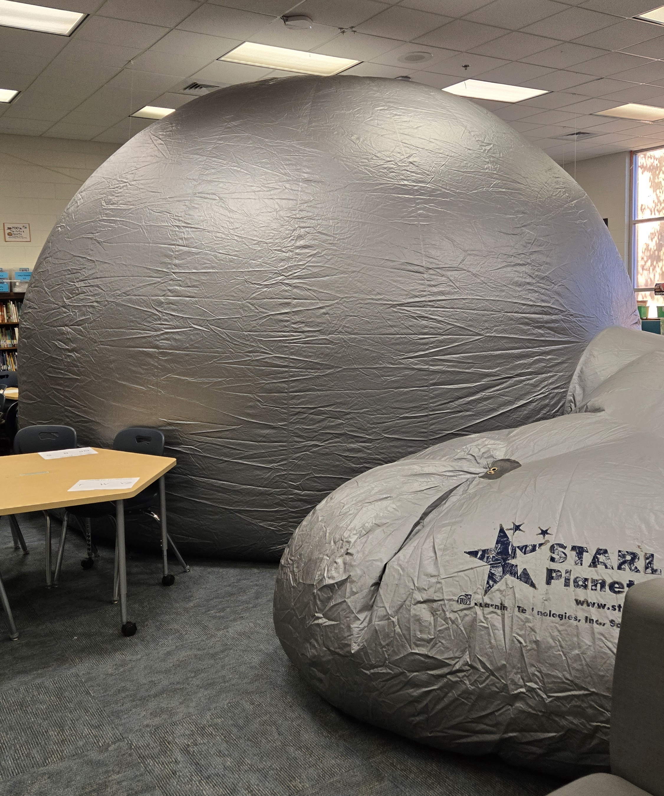 inflatable star lab is shown in the media center