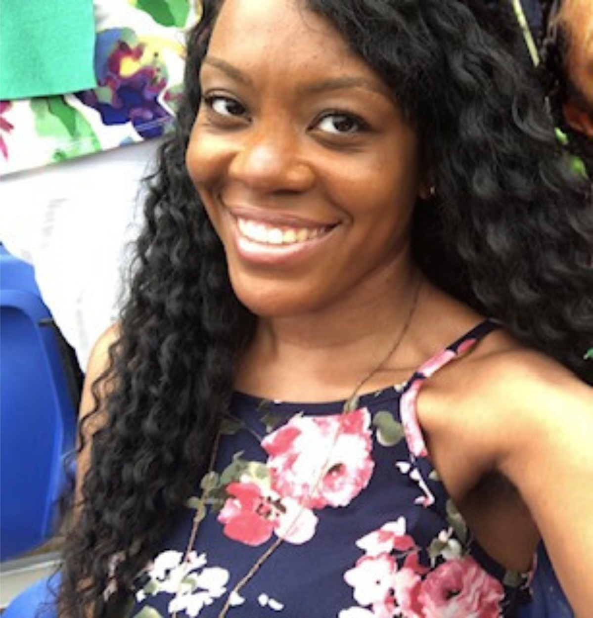 teacher of the year, Mrs. Ashley Allen - woman with blue top and floral print