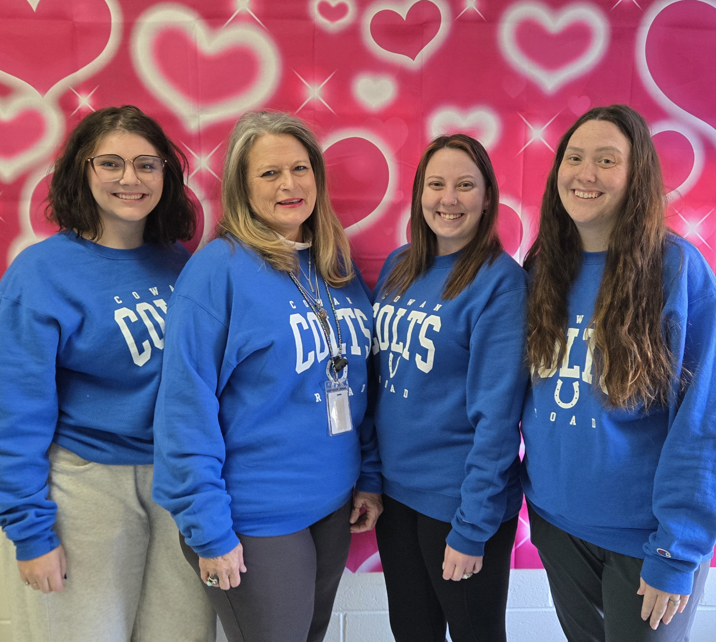 teachers in blue Cowan Colts shirts