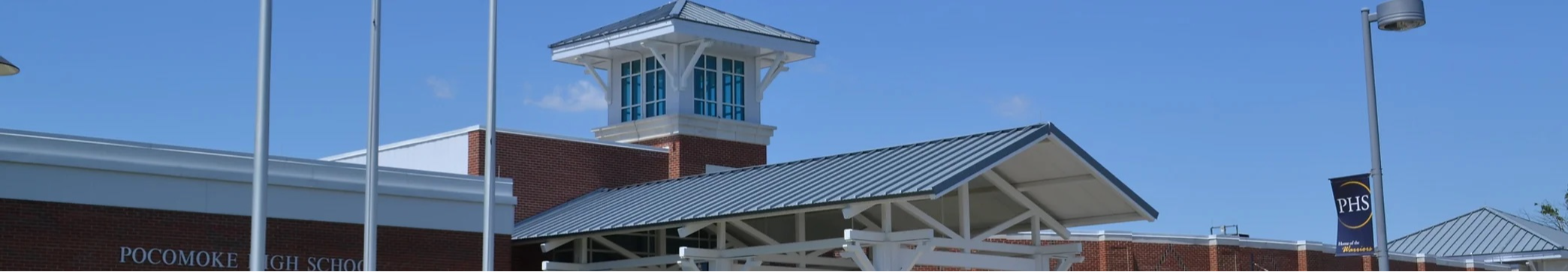 Pocomoke High School building on a bright and sunny day.