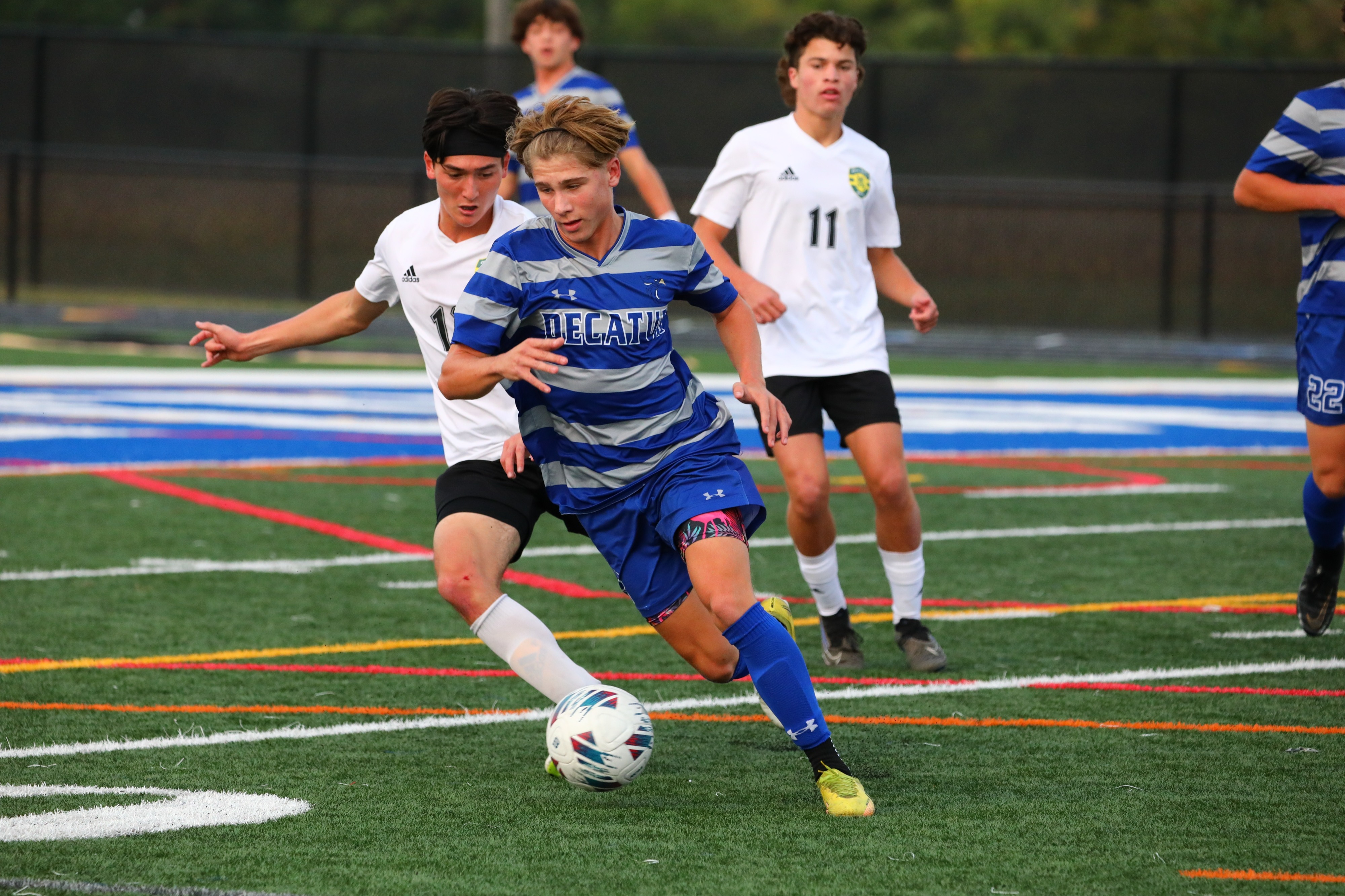 JV soccer player on field