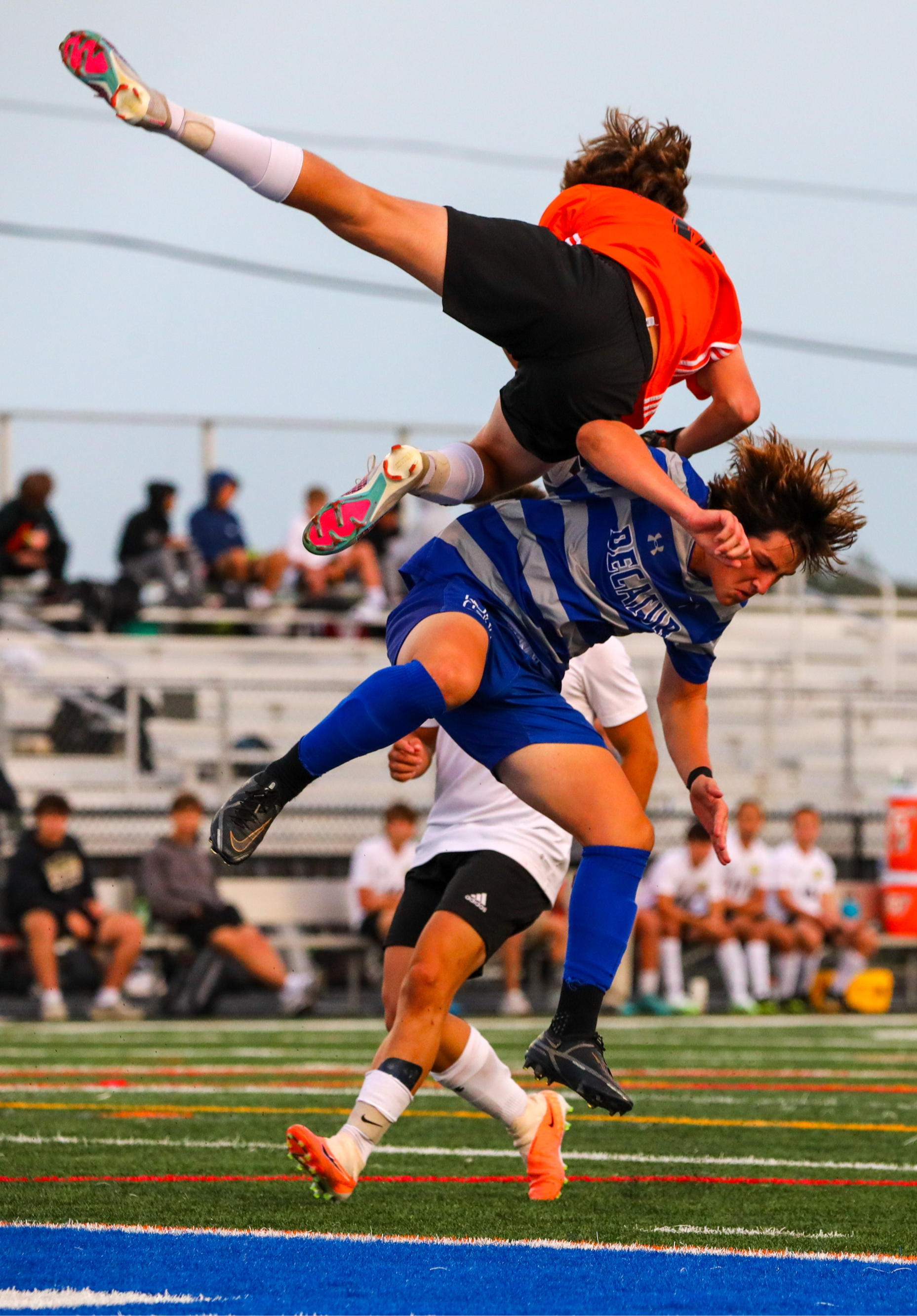 Varsity boy on field