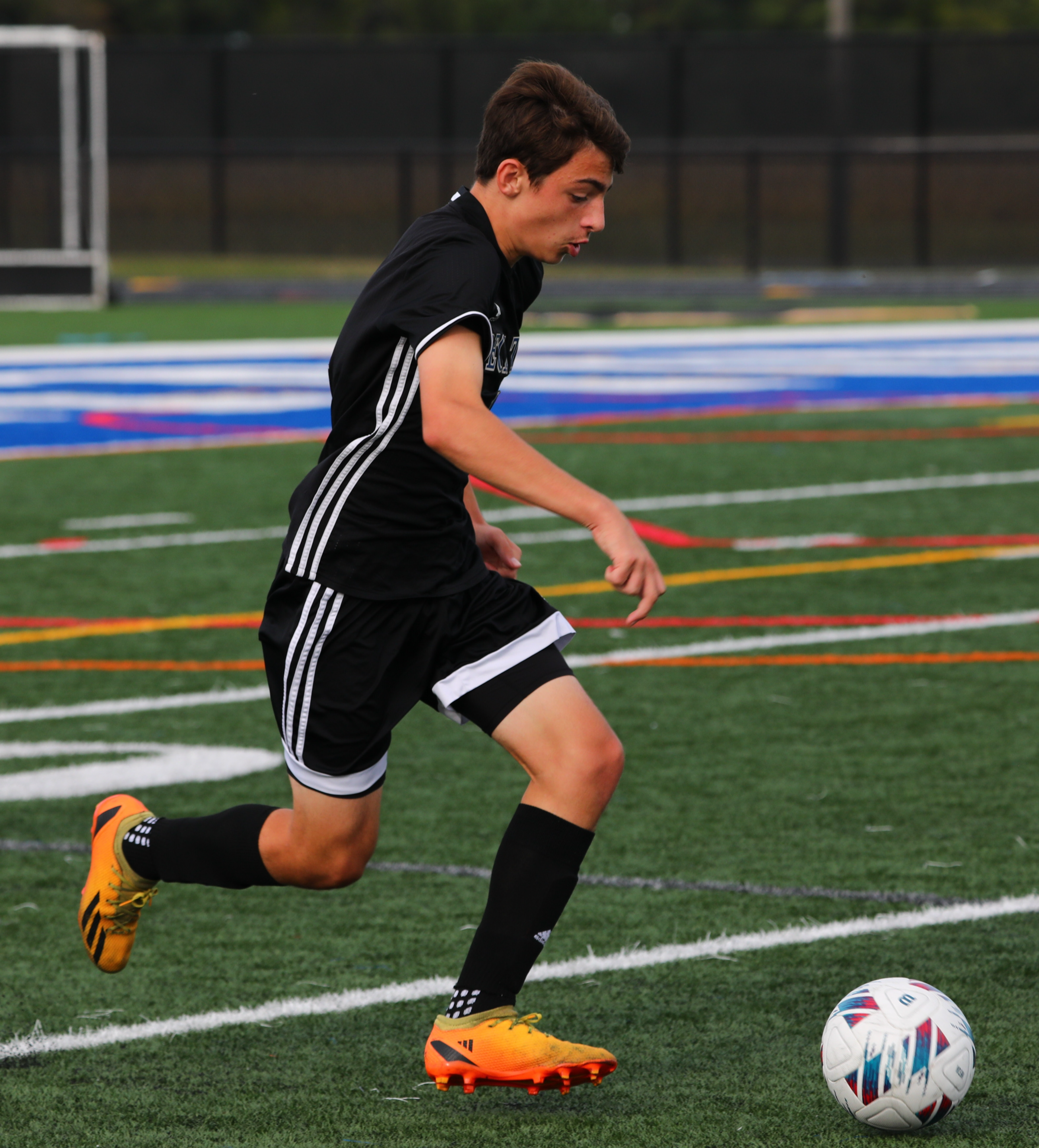 JV soccer player on field