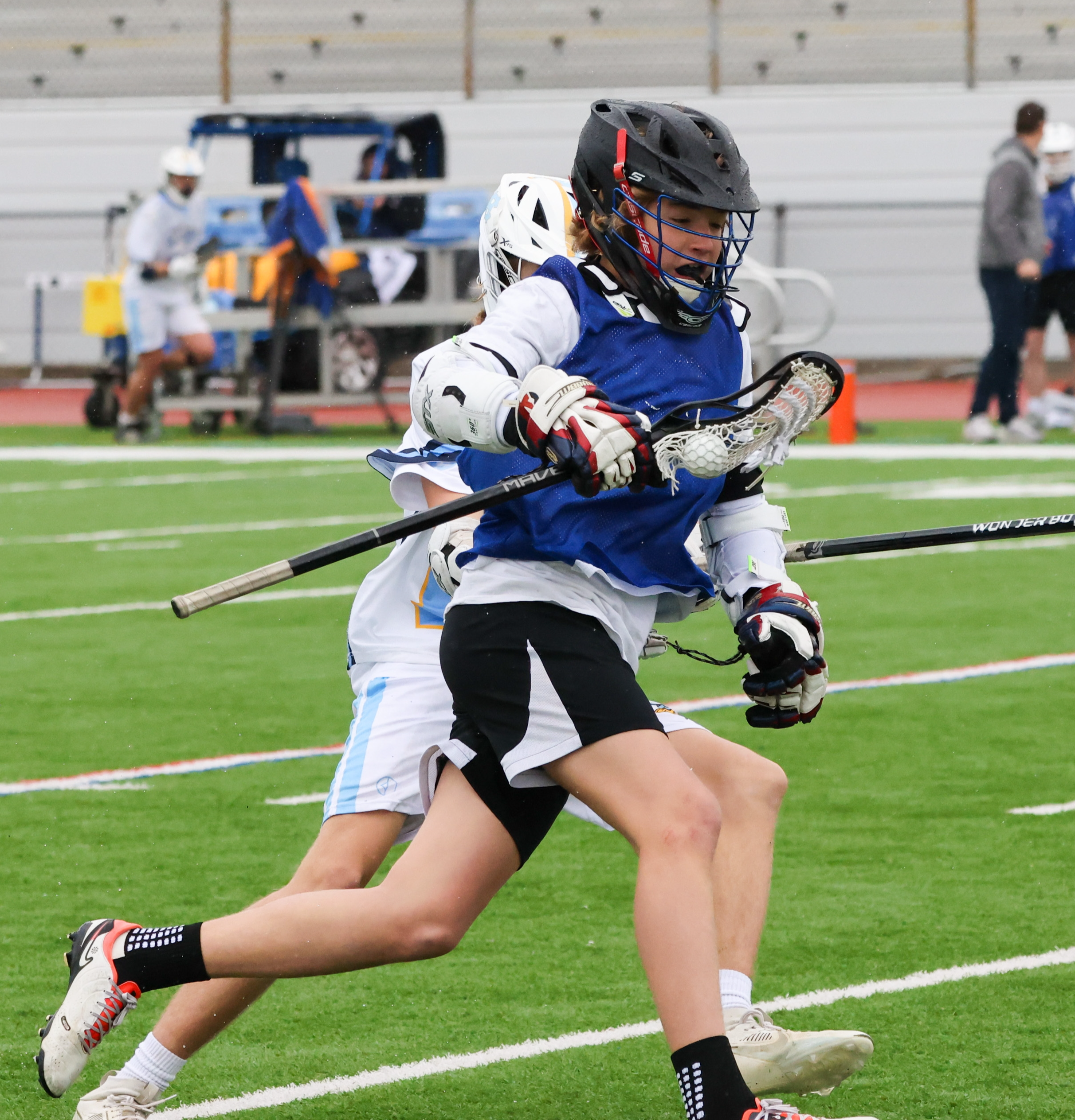 JV player running up LAX field