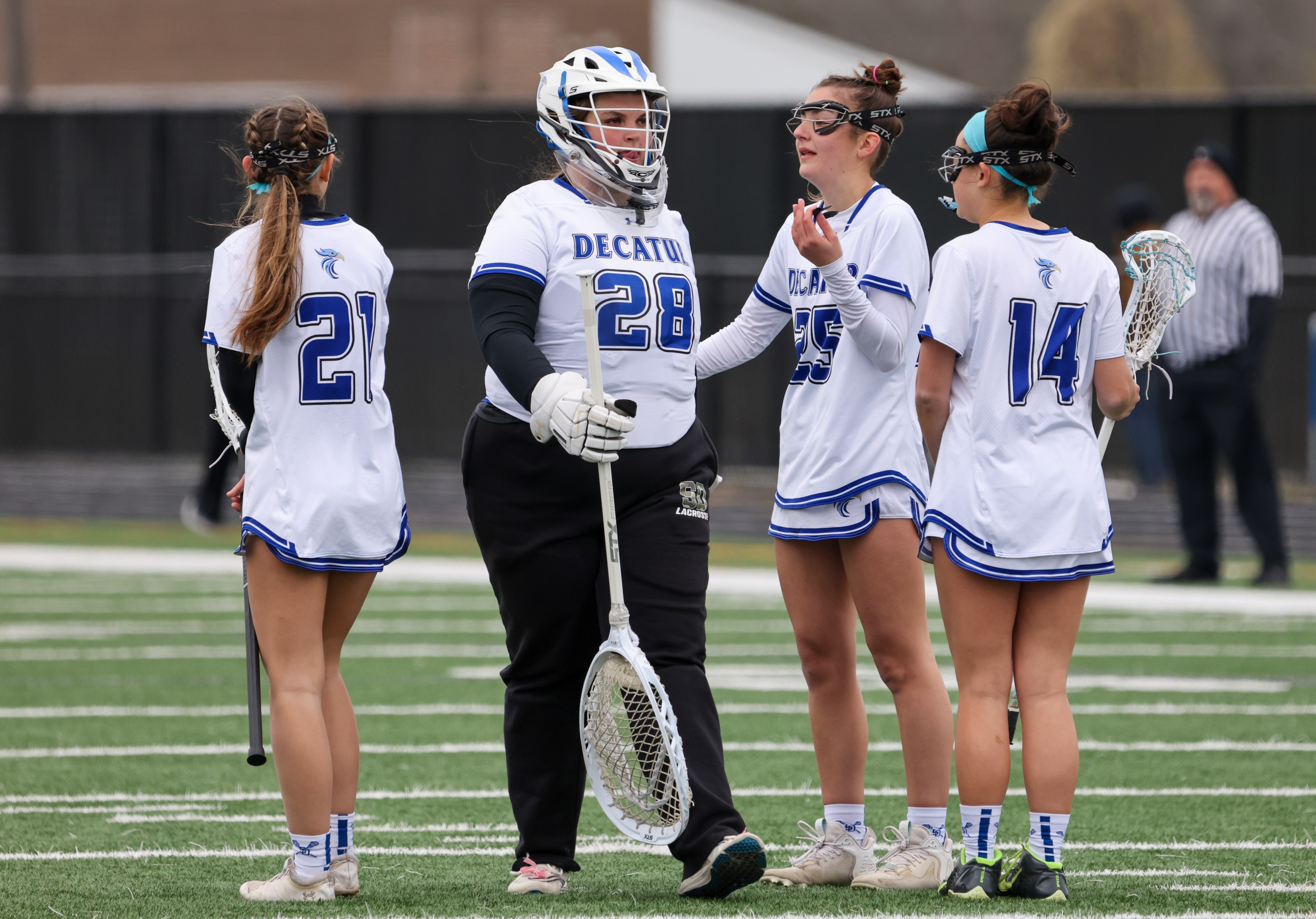 LAX Varsity girls on field