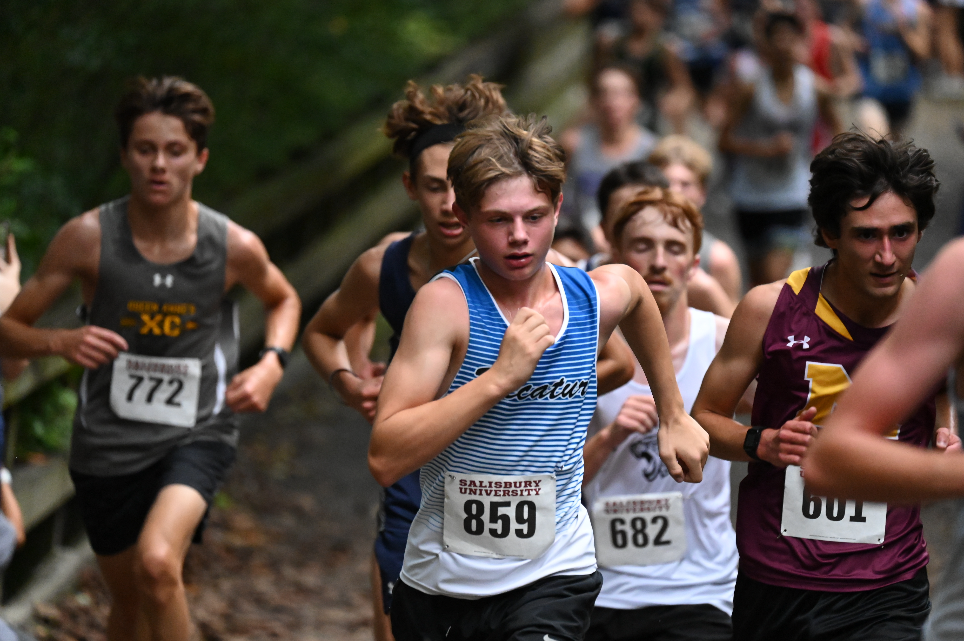 boy running in meet 2024