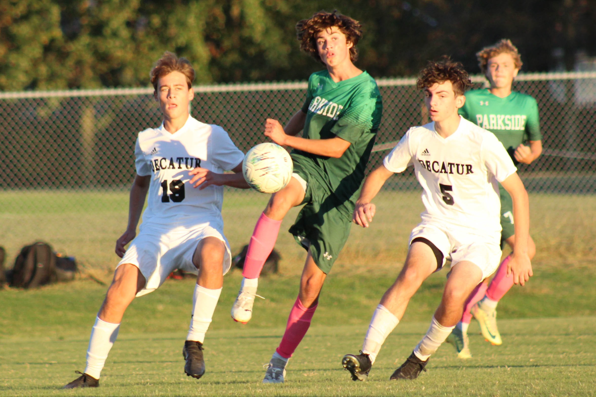 JV soccer players on field