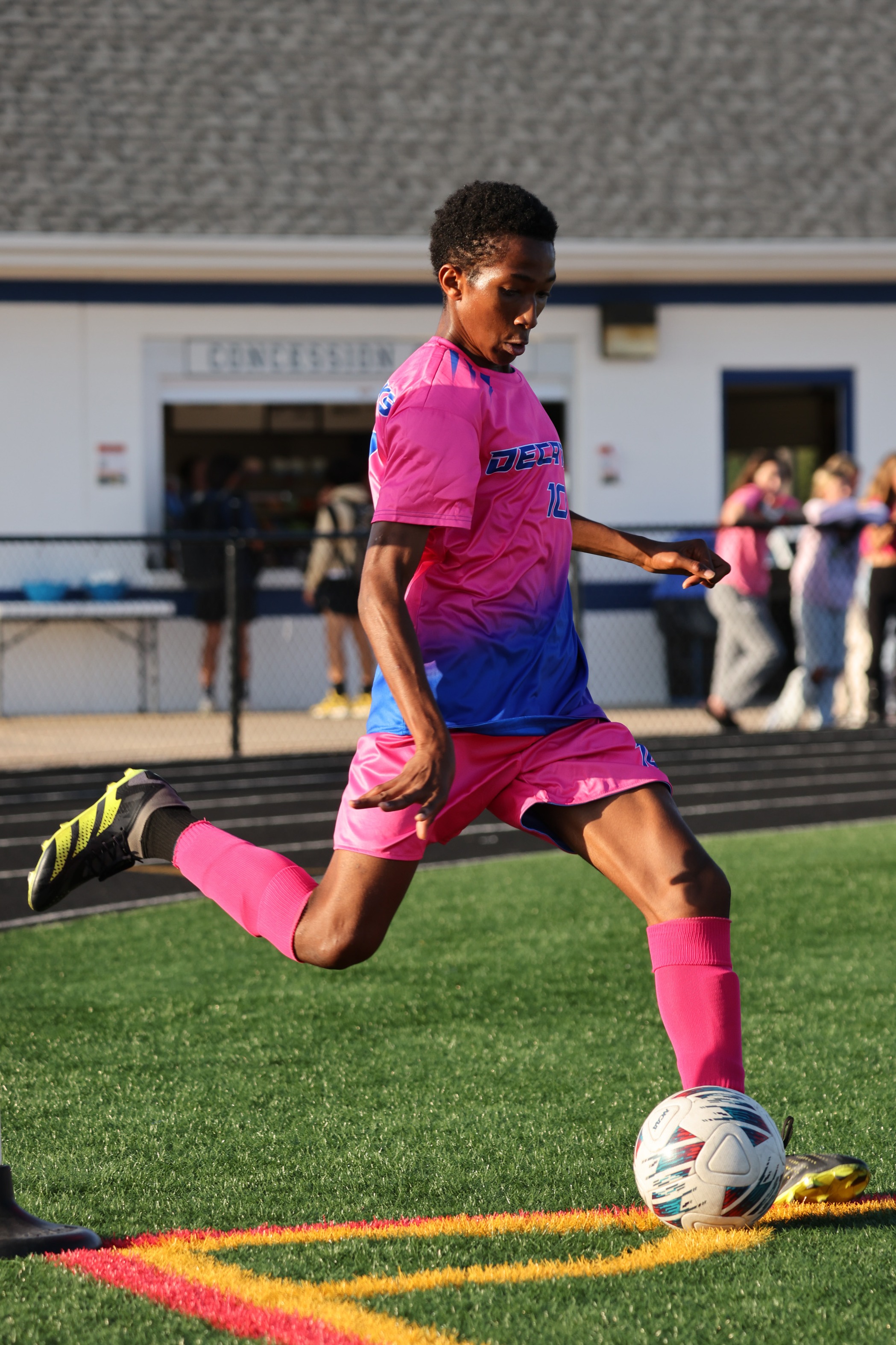 Varsity boy on field