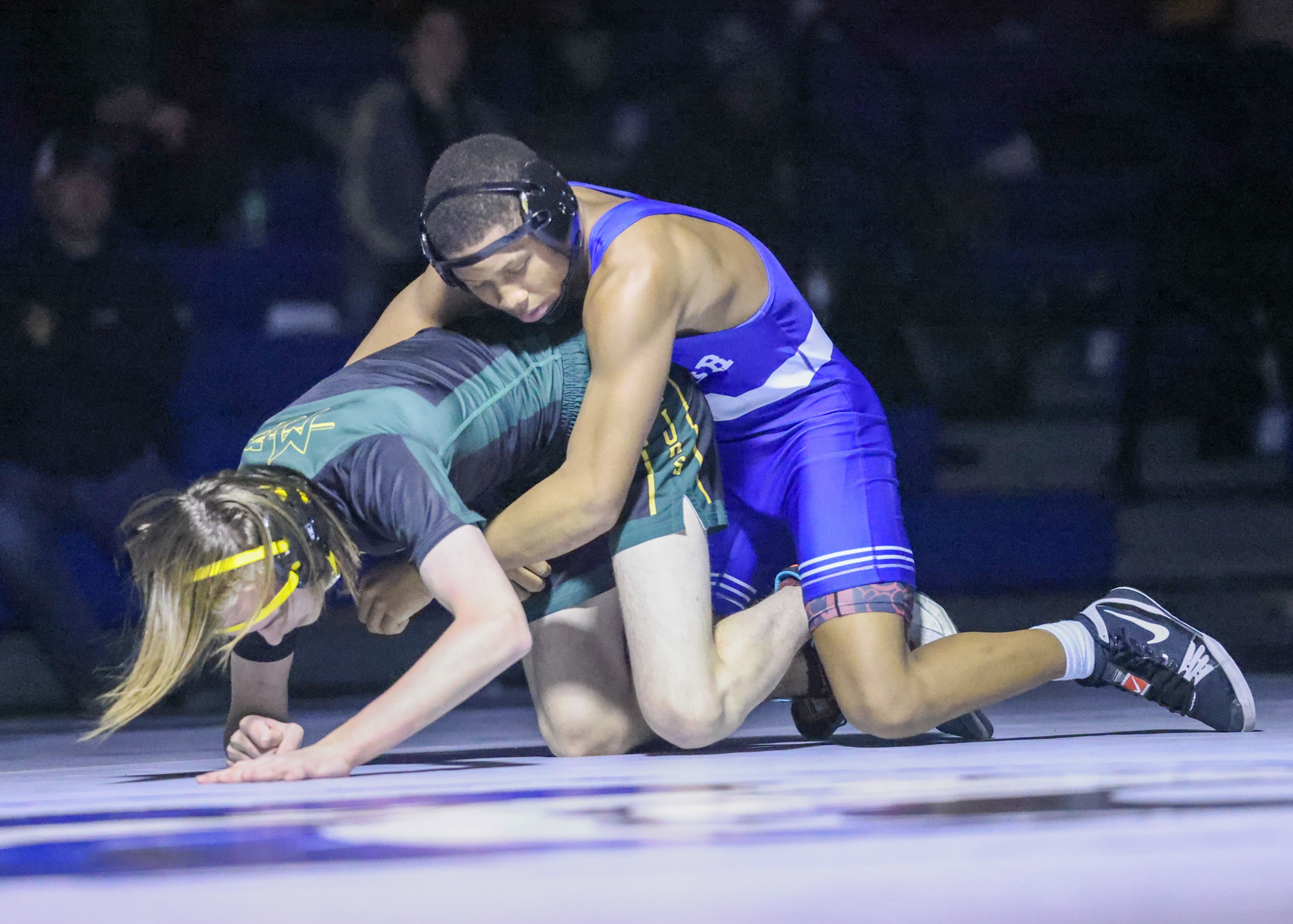 wrestlers on the mat