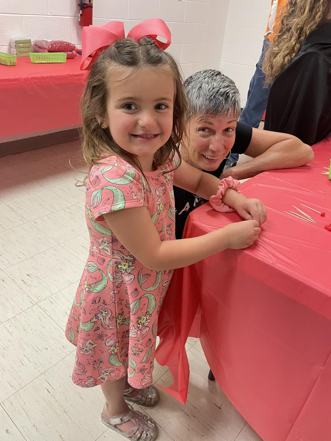 child with retired teacher 