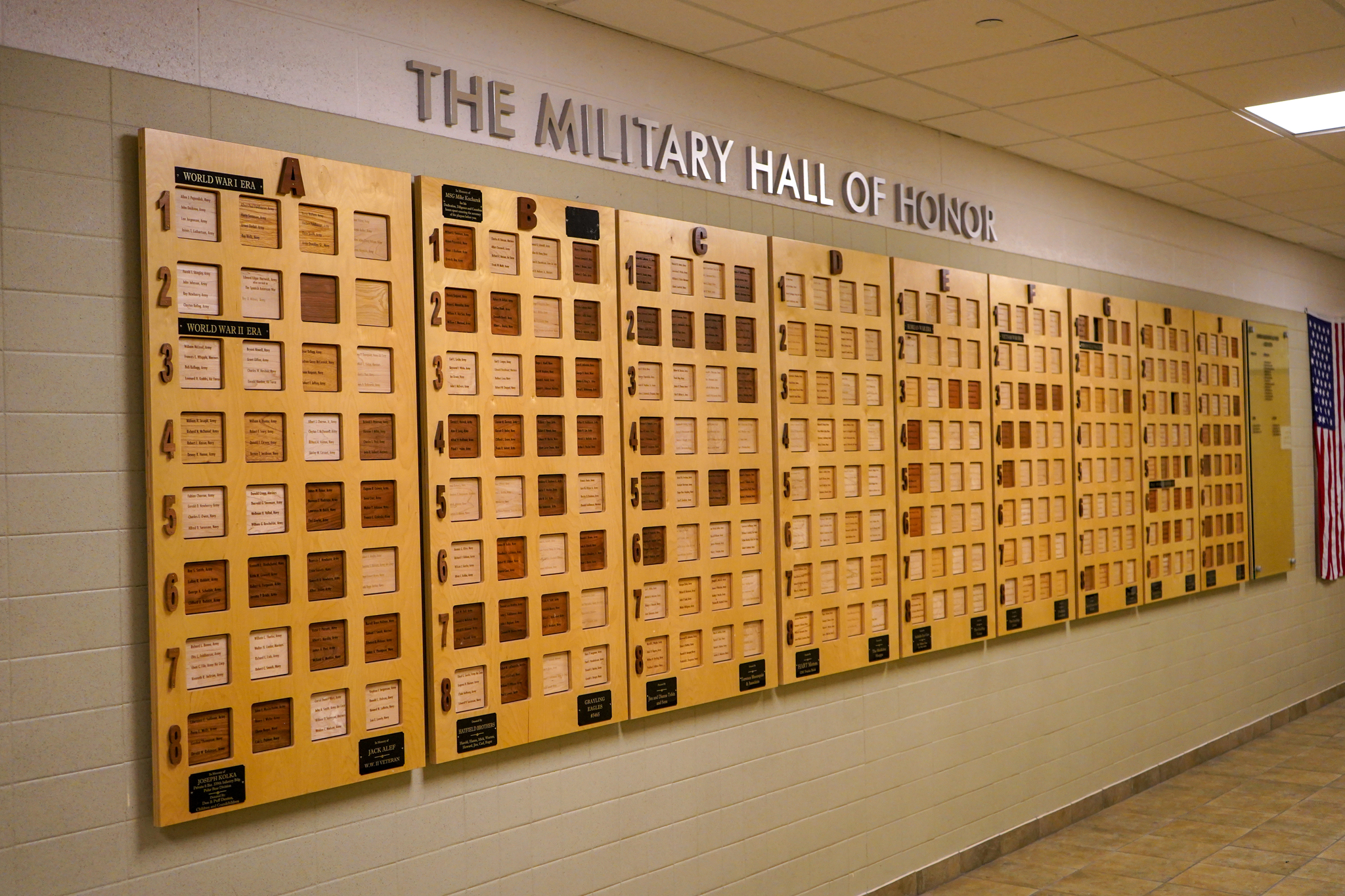 military wall of honor in hallway