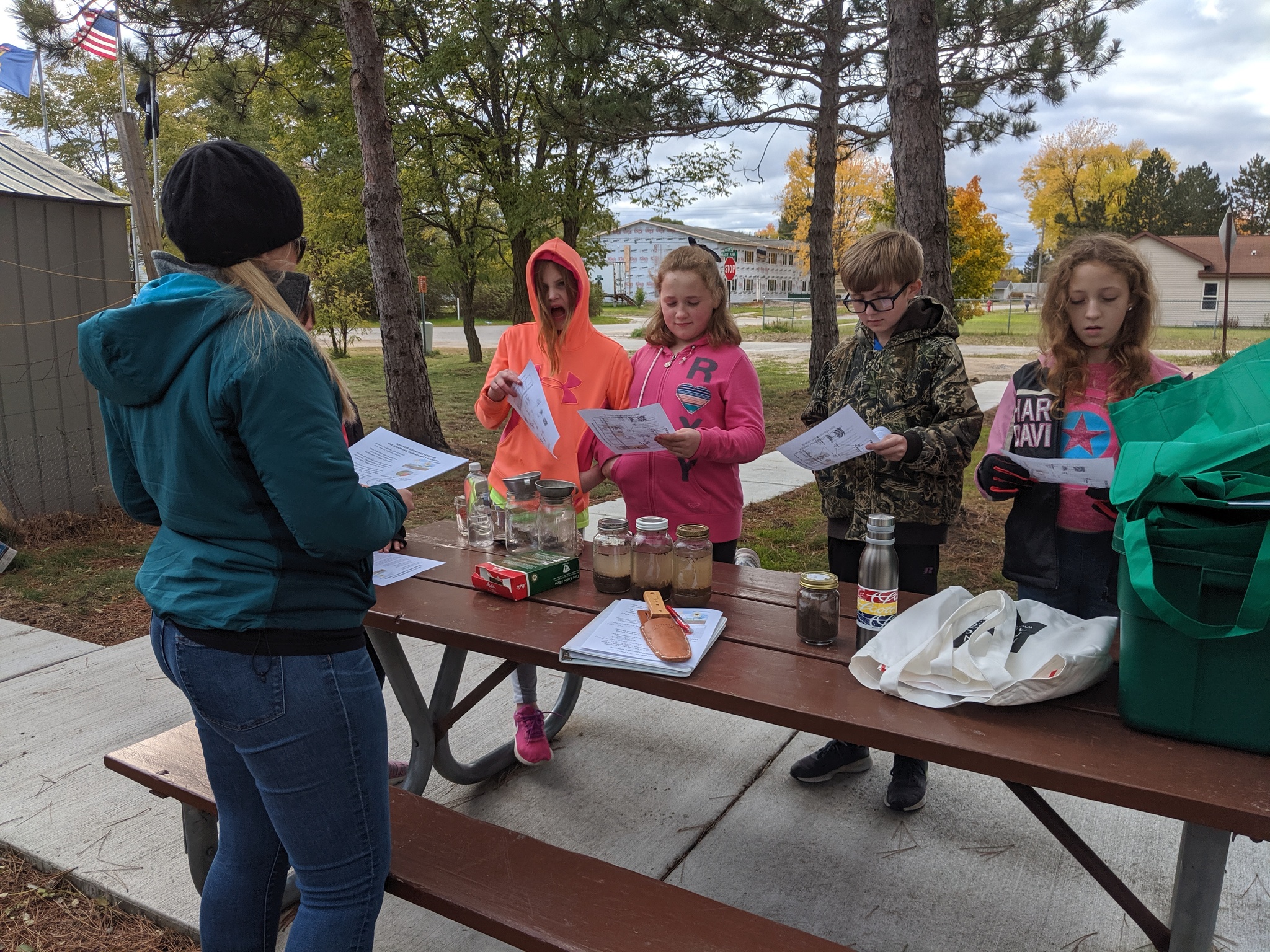 5th graders in the Huron Pines Healthy Kids After-School Program learn about different soils at the community garden - September 2020