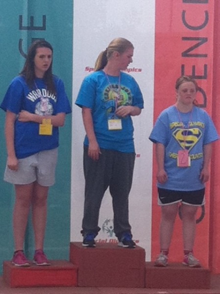 kids on platform at special olympics