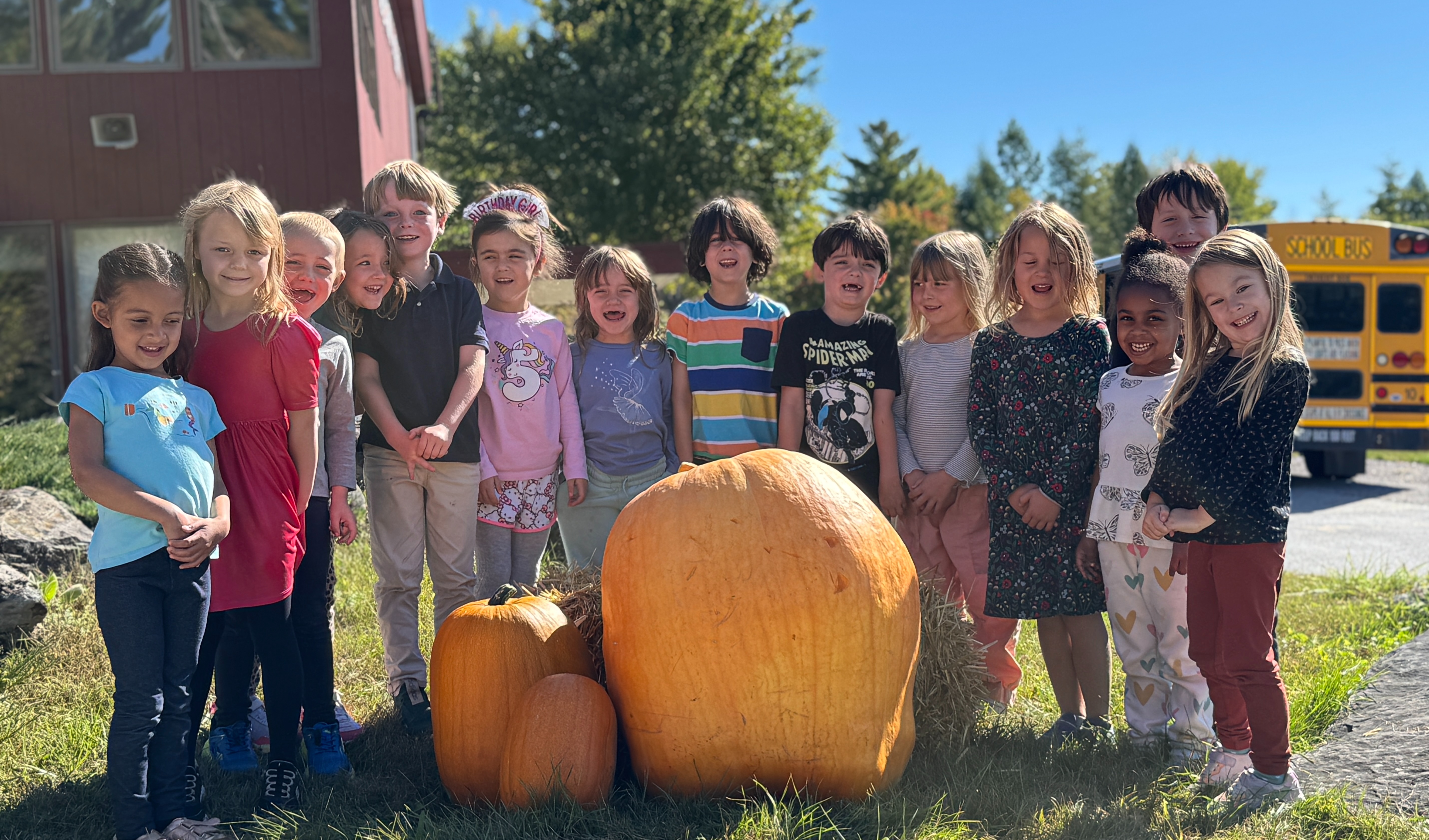 Kindergarten students and pumpkins