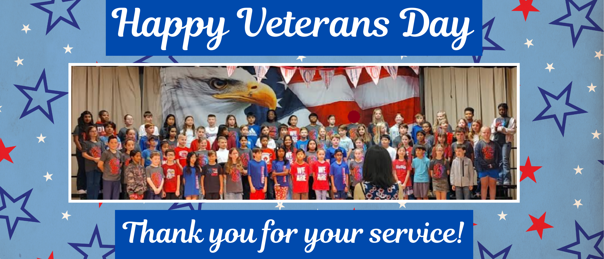 Happy Veterans Day. Thank you for your service! 4th graders singing on stage.