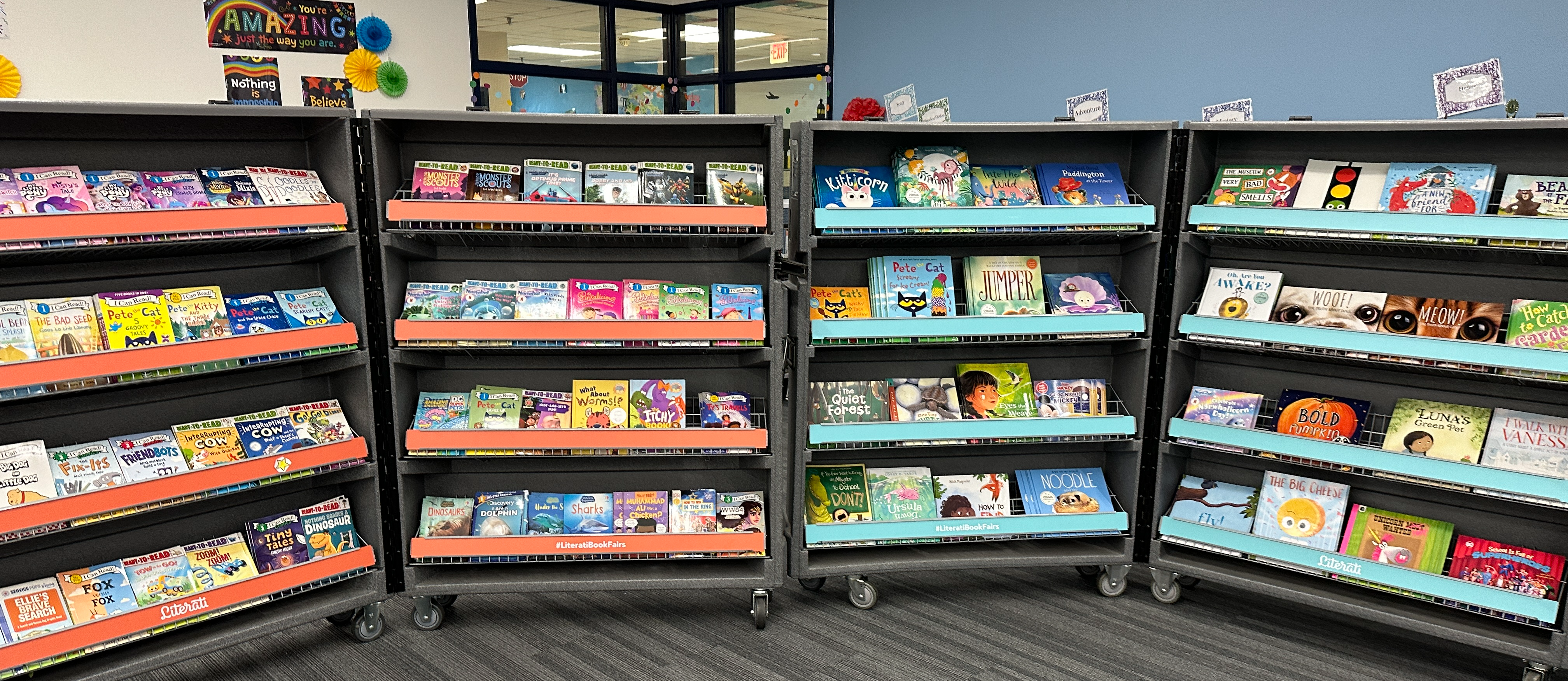 library with book fair carts