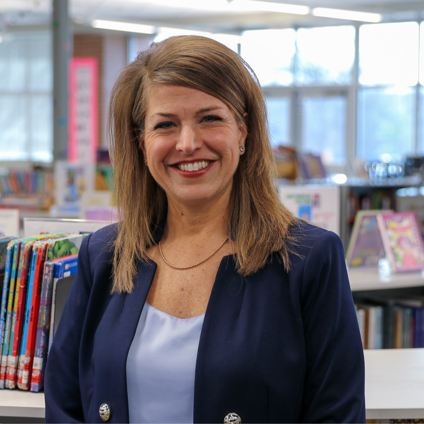 Principal Liz Hilcher smiling for camera