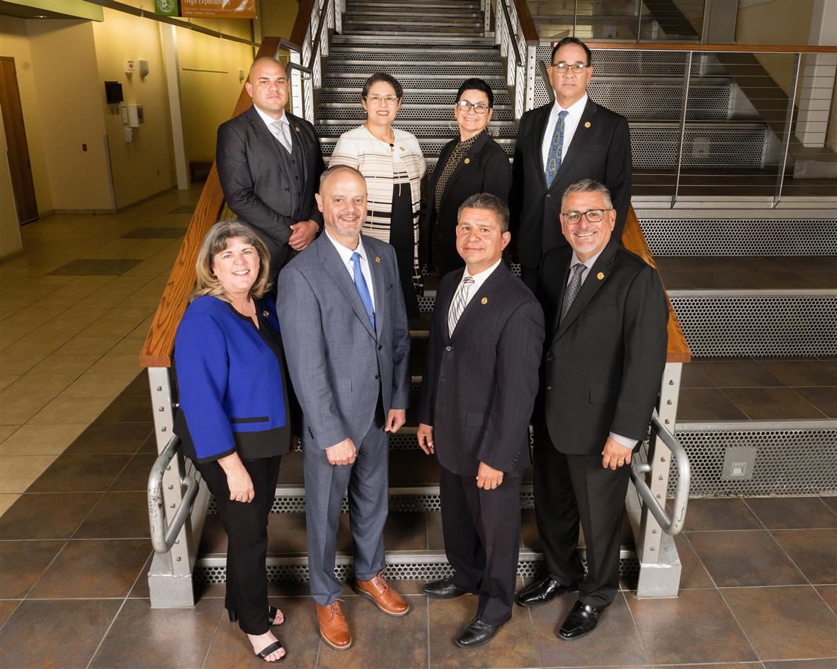 Trustees Pablo Barrera, Marivel N. Macias, Alice Gardea, and Ricardo O. Castellano. Bottom row from left to right: Vice President Cynthia Ann Najera, Superintendent Dr. Nate Carman, President Michael A. Najera, and Secretary Paul Guerra.