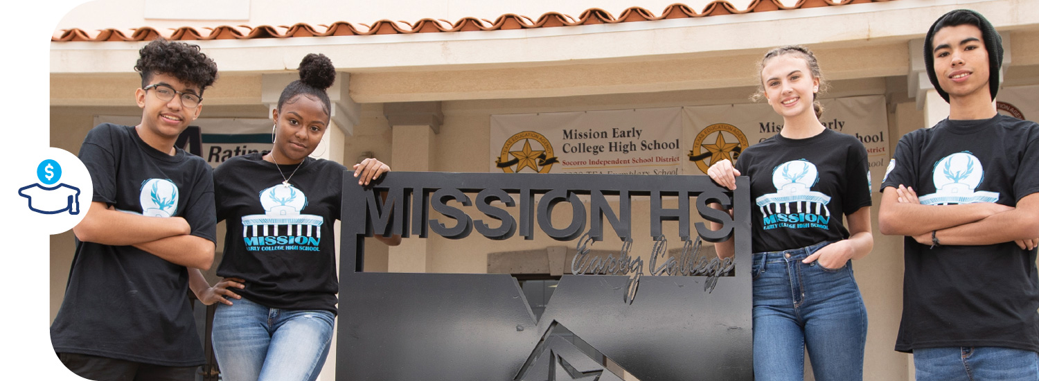Mission Early College High School students standing next to their school's front sign