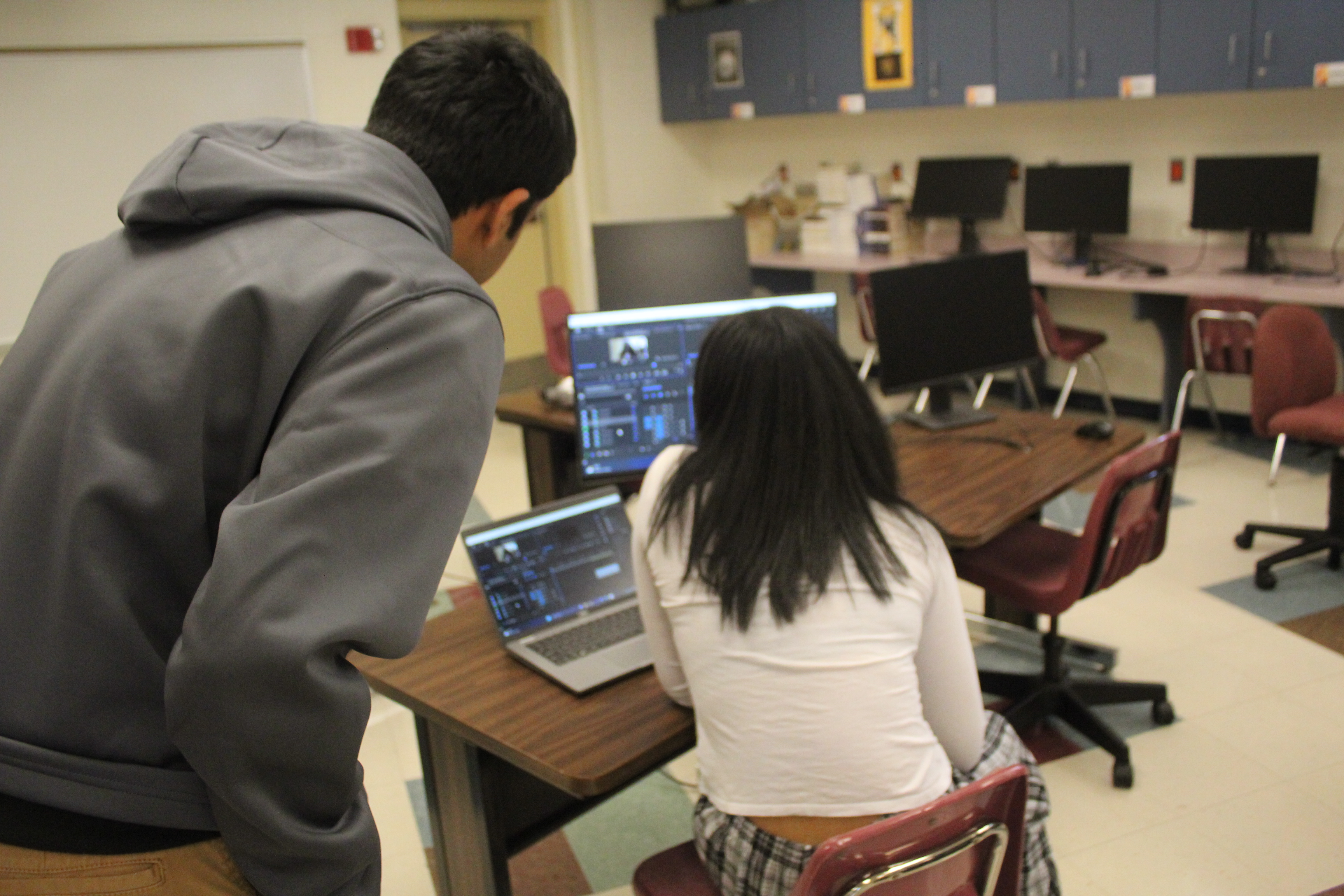 students collaborate on a video project