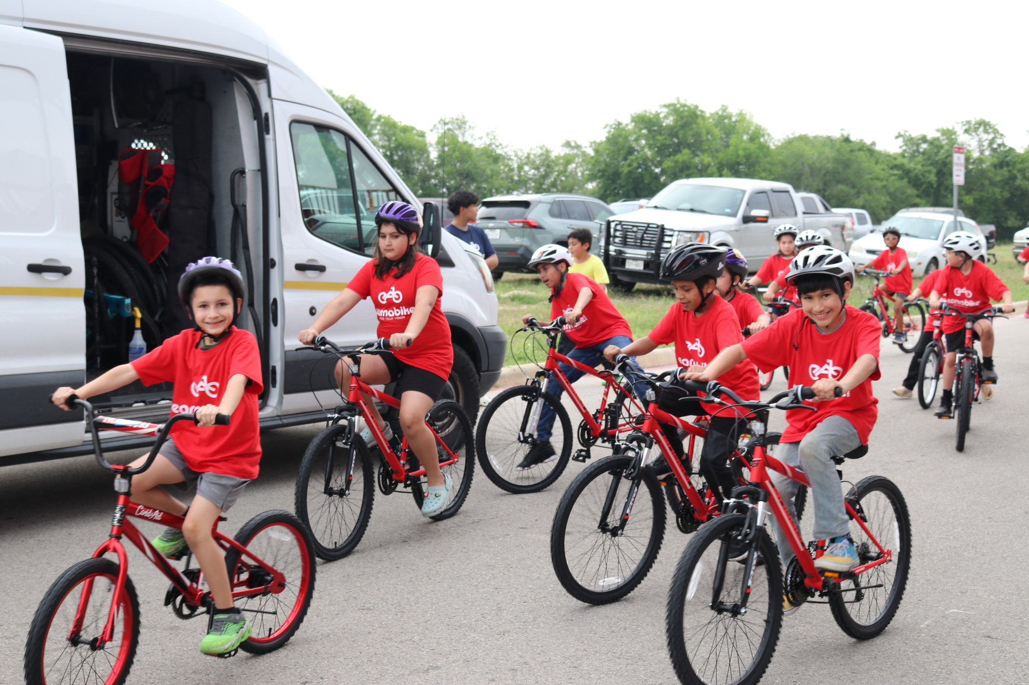 5 children on bicycles