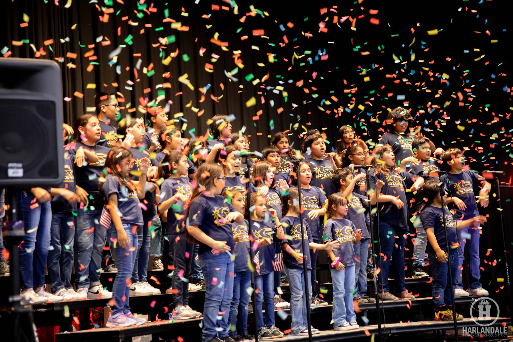elementary choir students singing 