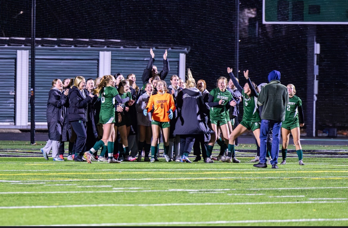 Girls soccer team celebrating