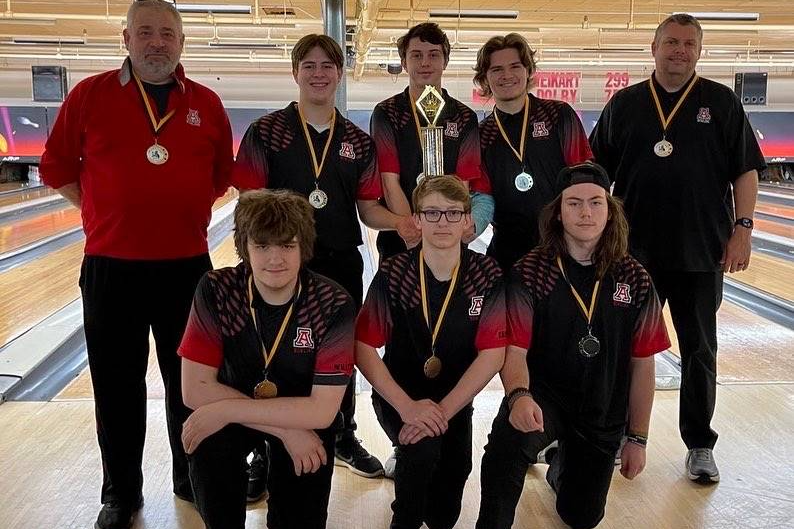 bowling team with their medals