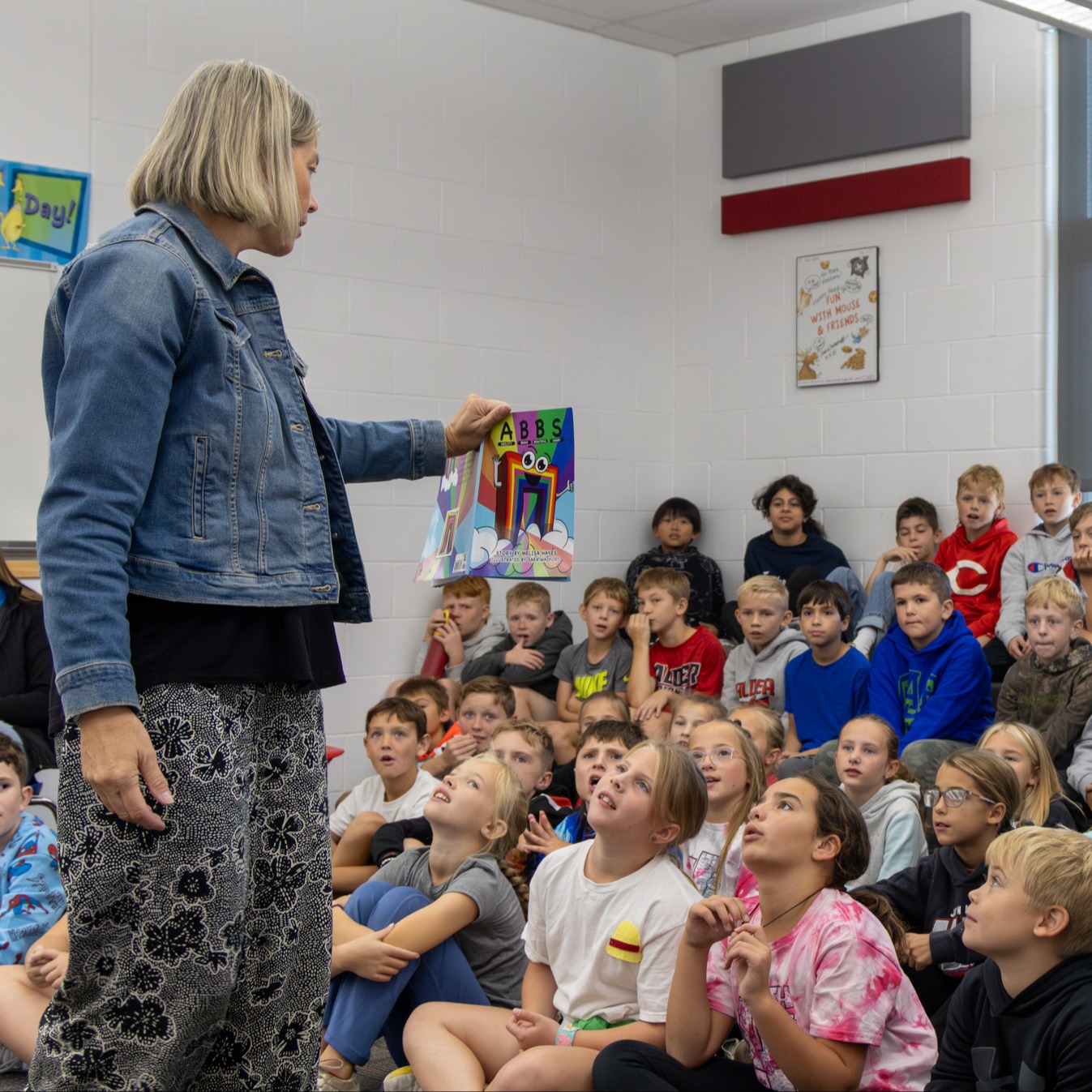 author with students