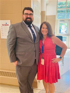 Two guidance counselors smiling in office