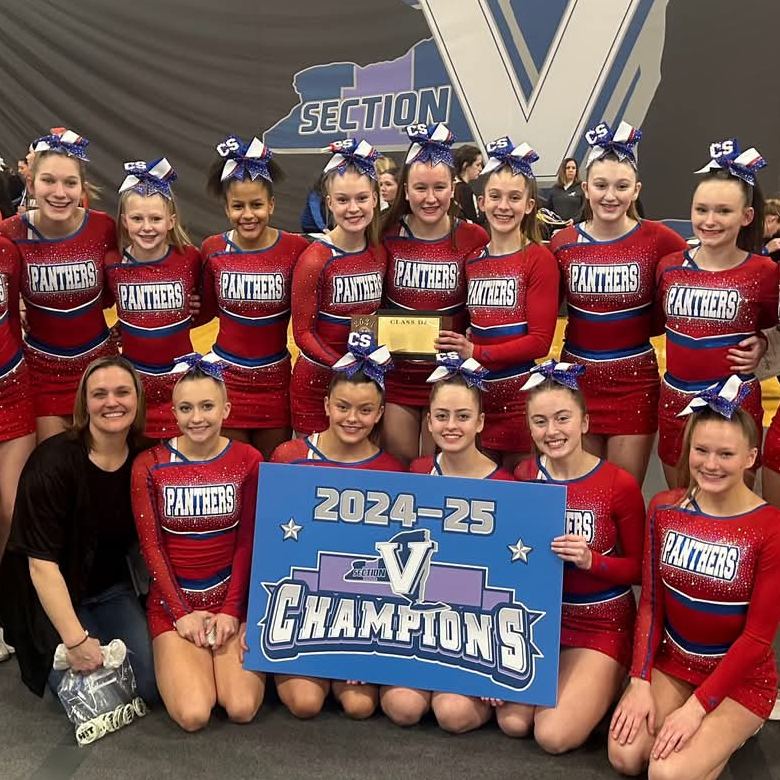 Cheer team with section V champion bannner