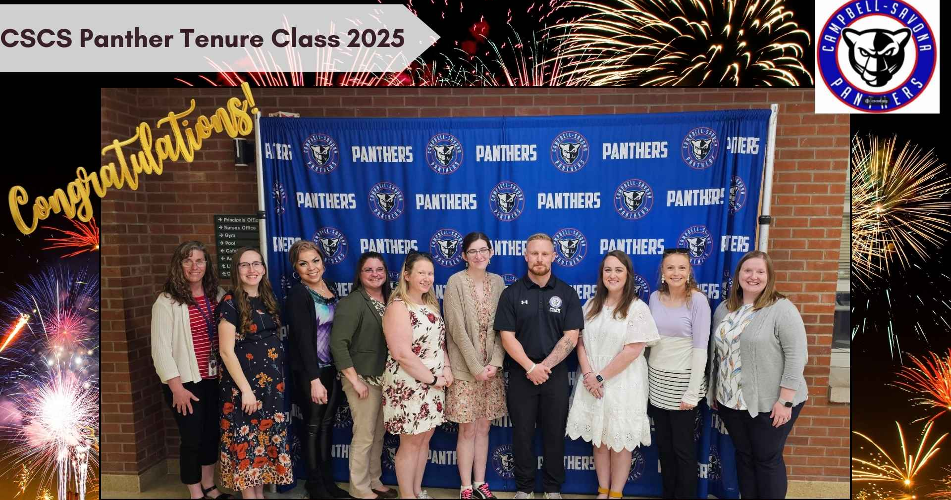 CS Tenure class picture in front of banner