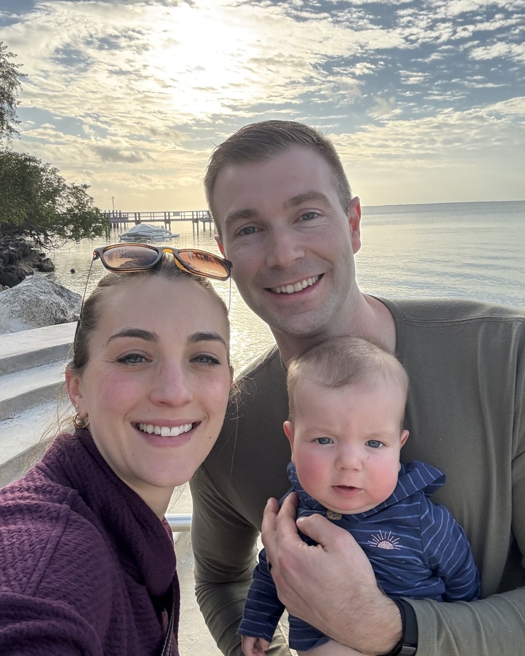 Picture of Will Cornet with wife and child