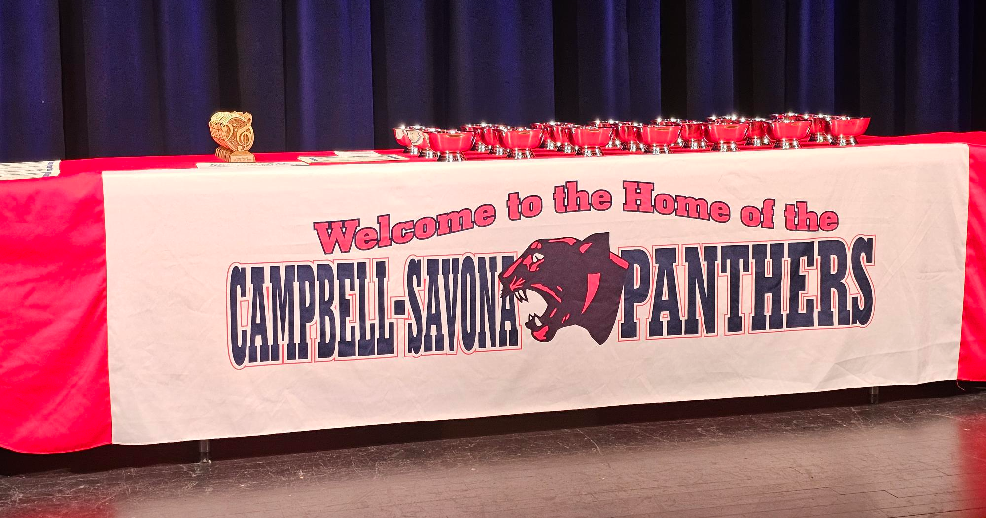 Panther banner and silver bowls