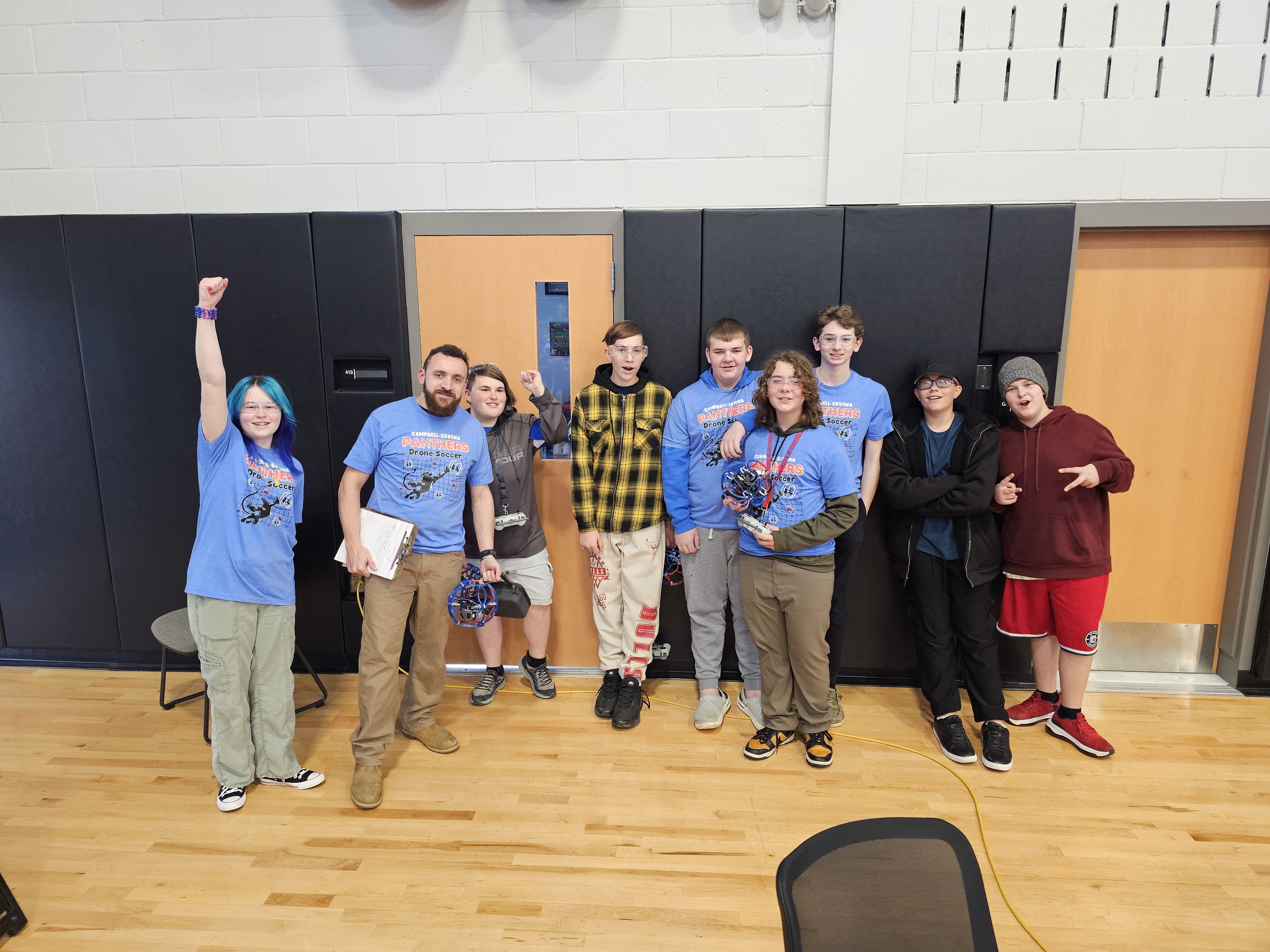 drone soccer team posing for picture