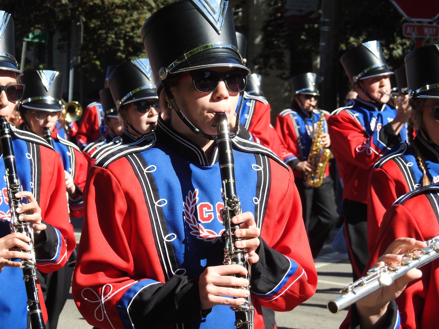 Marching band student playing clarinet