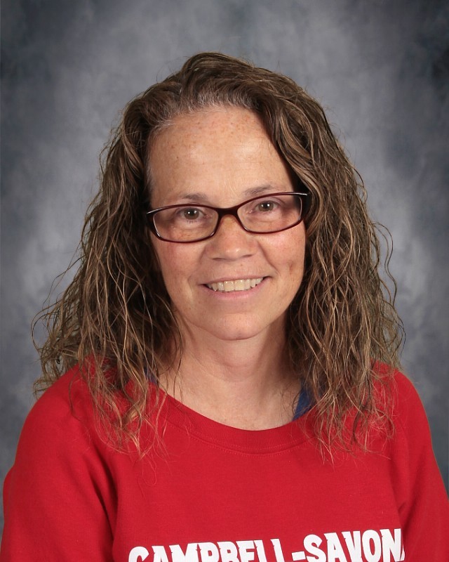 Picture of PE Health teacher in red shirt and glasses