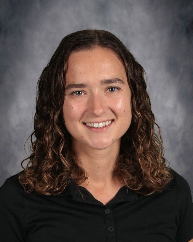 Picture of PE teacher with long curly brown hair