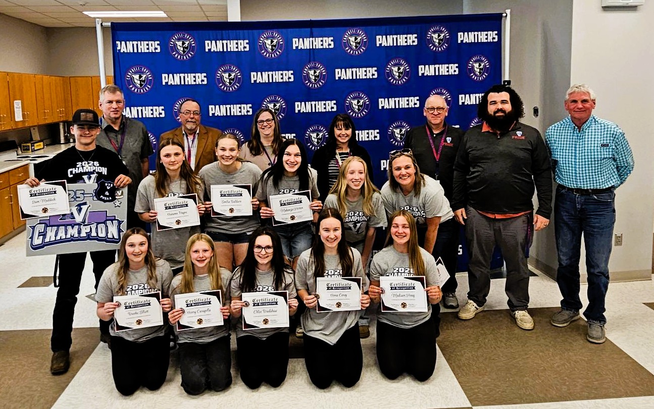 Group photo of boe and athletes in front of panther banner