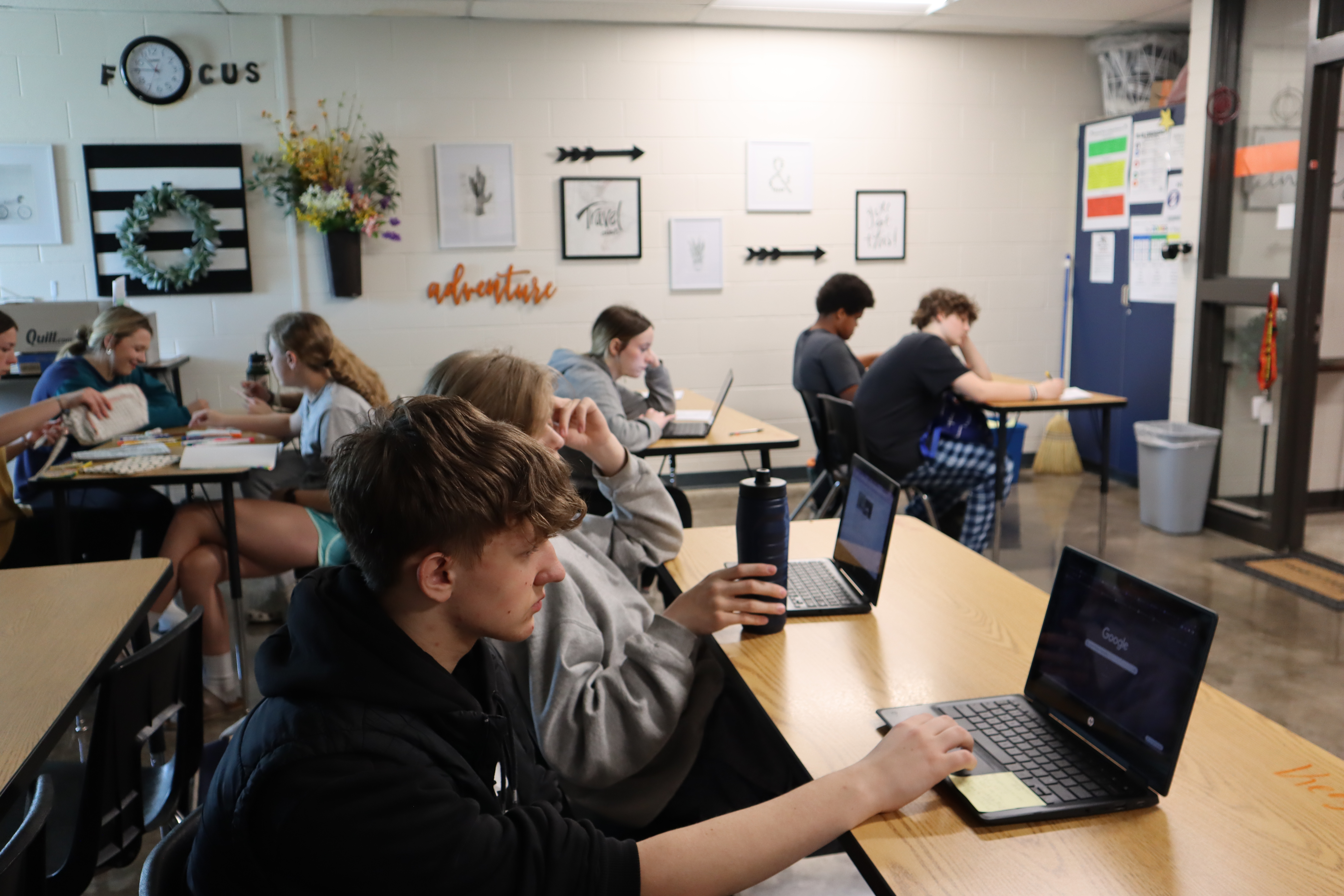 students with laptops
