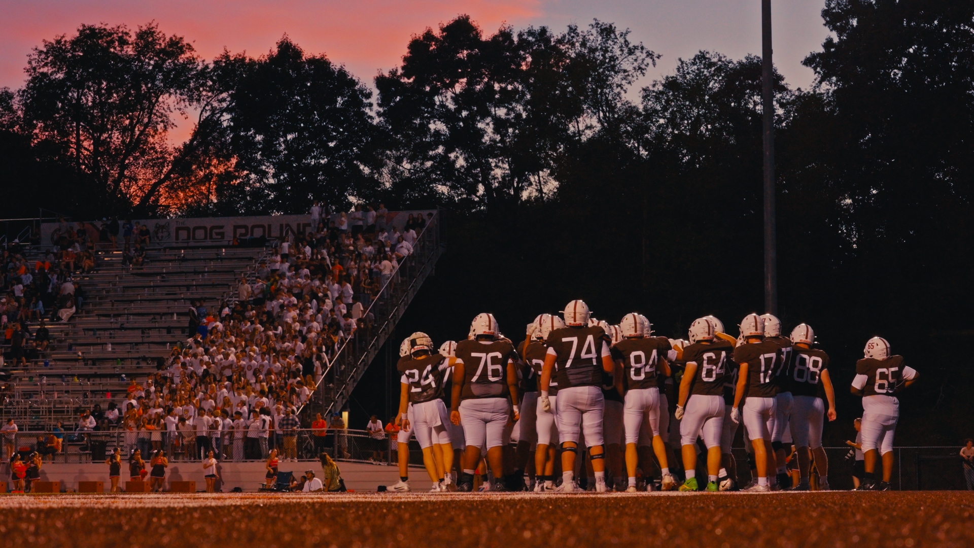 Northern Football team under a sunset