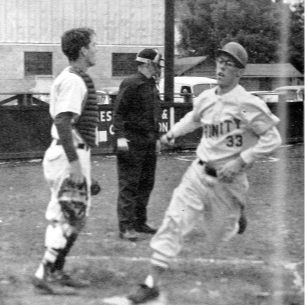 two baseball players playing a game