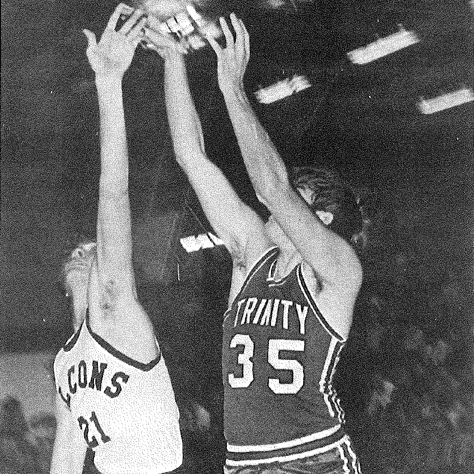 two basketball players playing