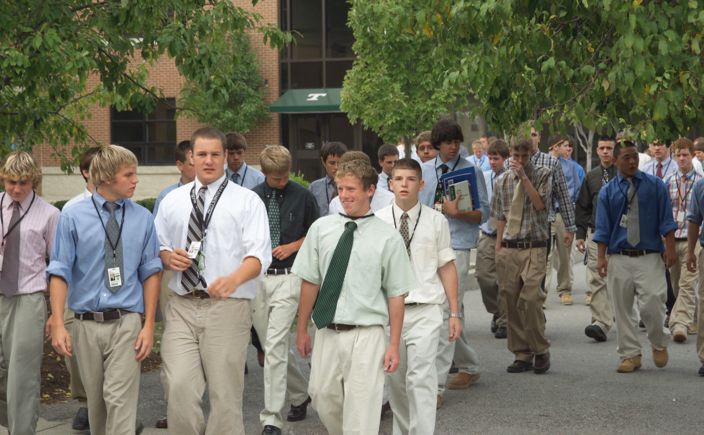 group of people walking and smiling