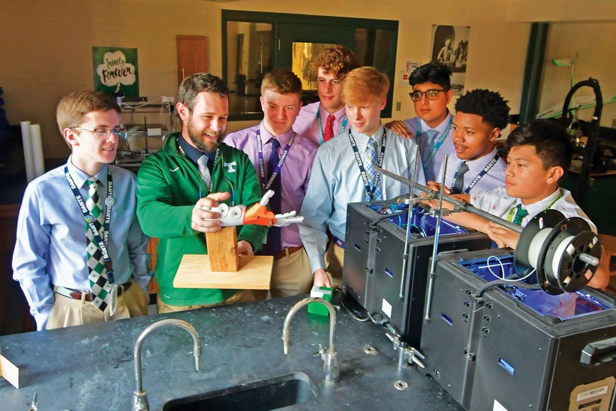 students gathered around doing a science experiment